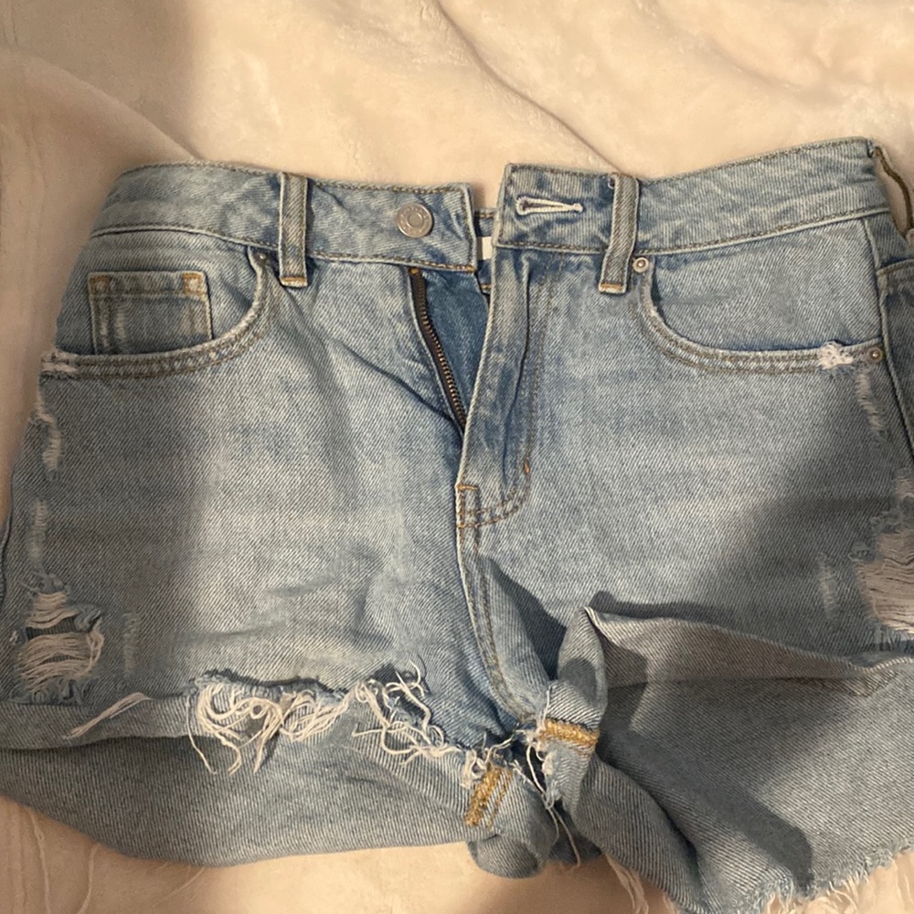 ripped jean shorts, worn